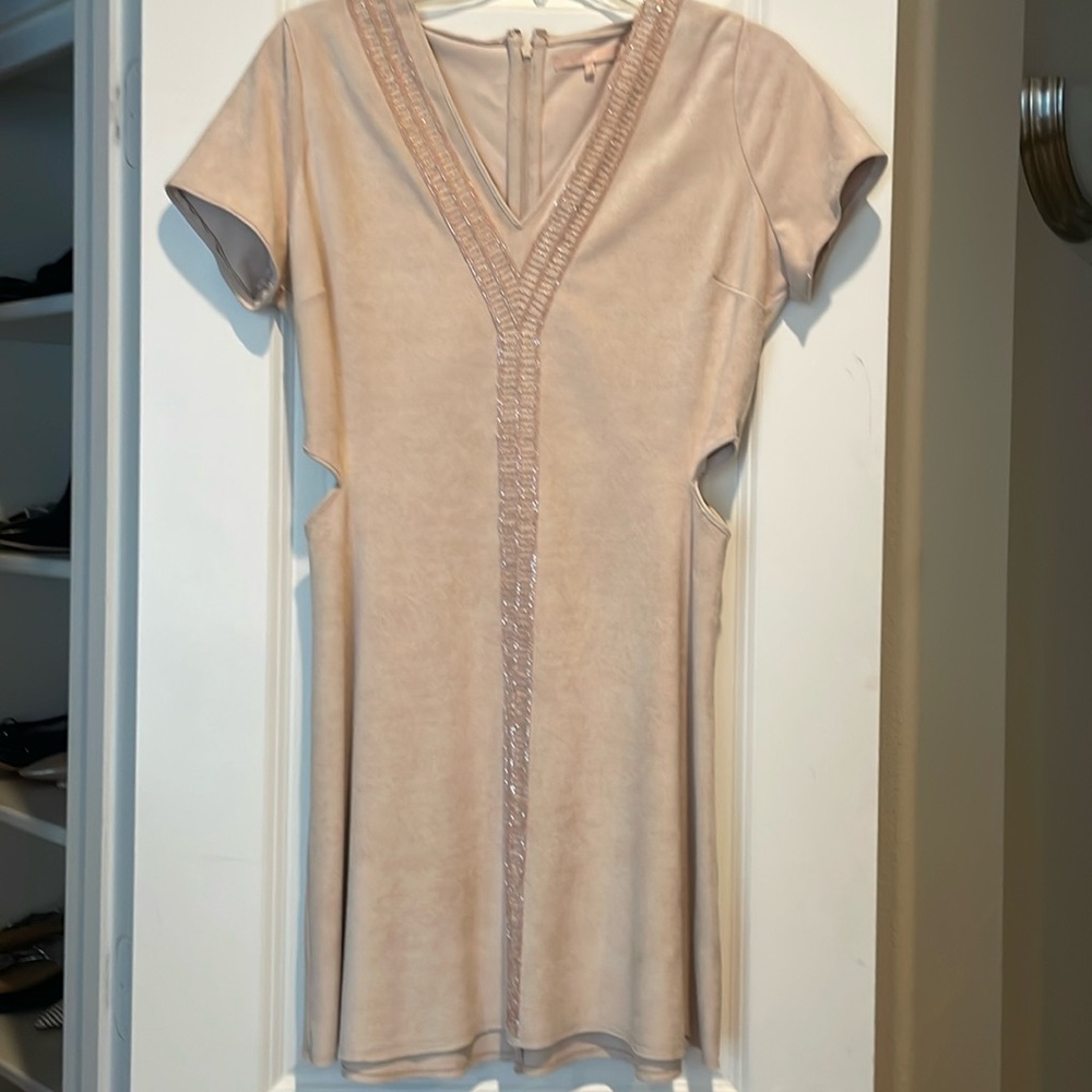Cream dress with side cut outs